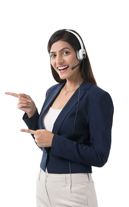 A sming women wearing a headset and business attire,pointing to her left while standing against a plain background